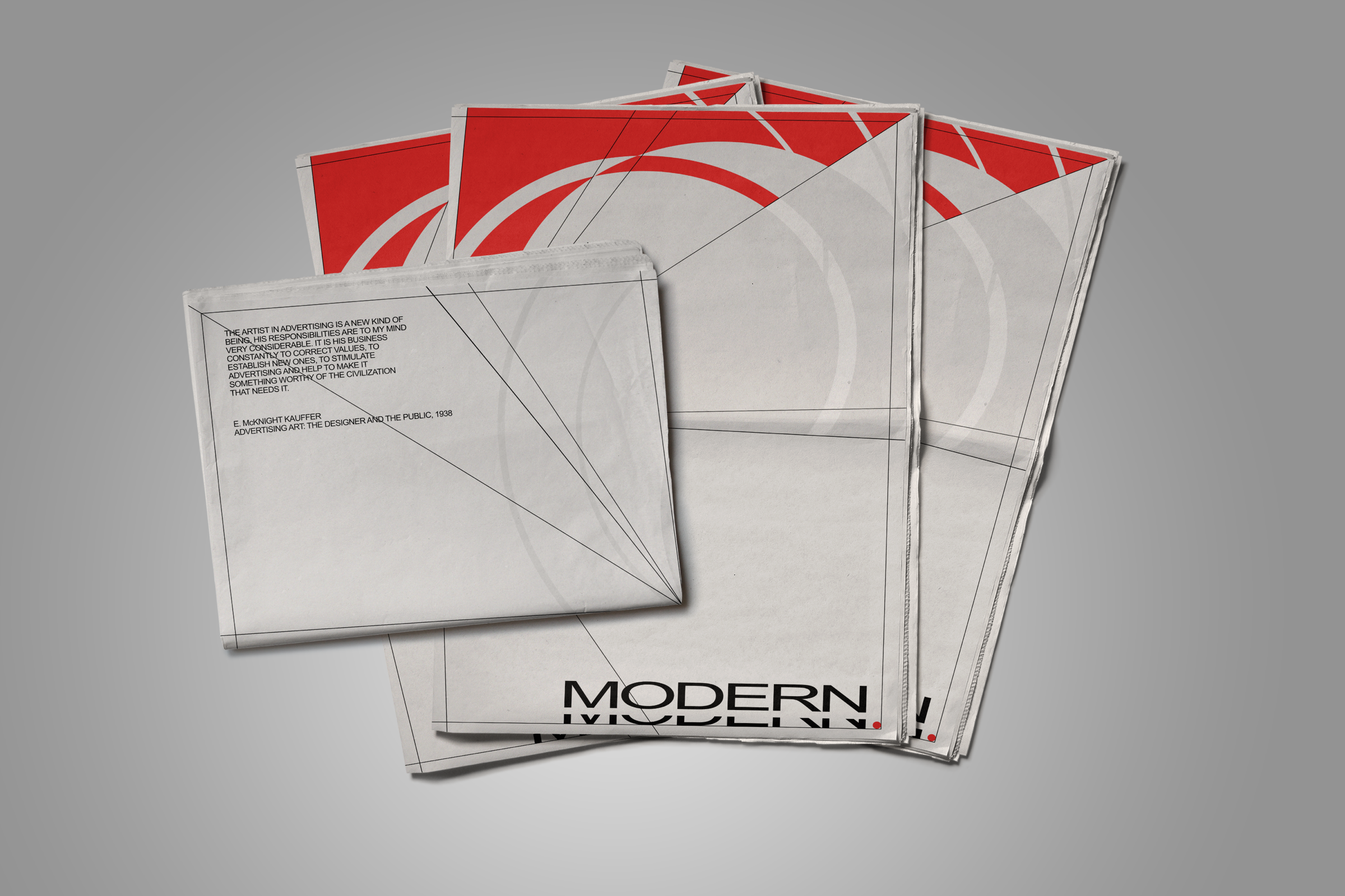 Stacked copies of Modern Underground, a newspaper-like exhibition guide